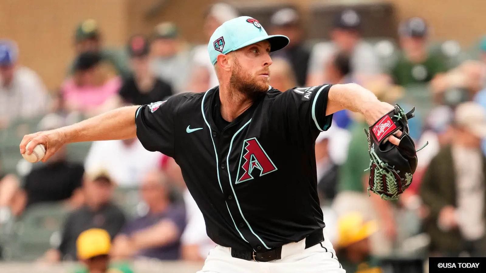 Merrill Kelly throws a pitch